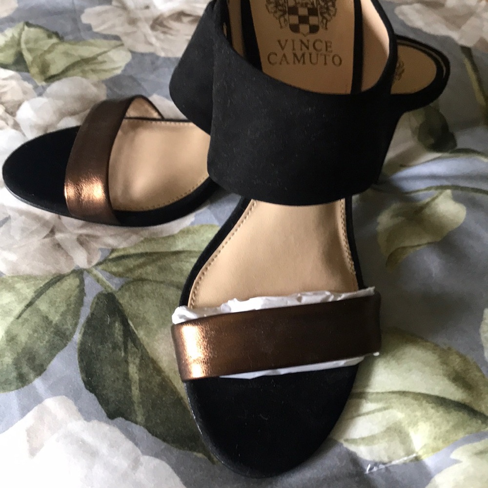 Never worn black and copper heels